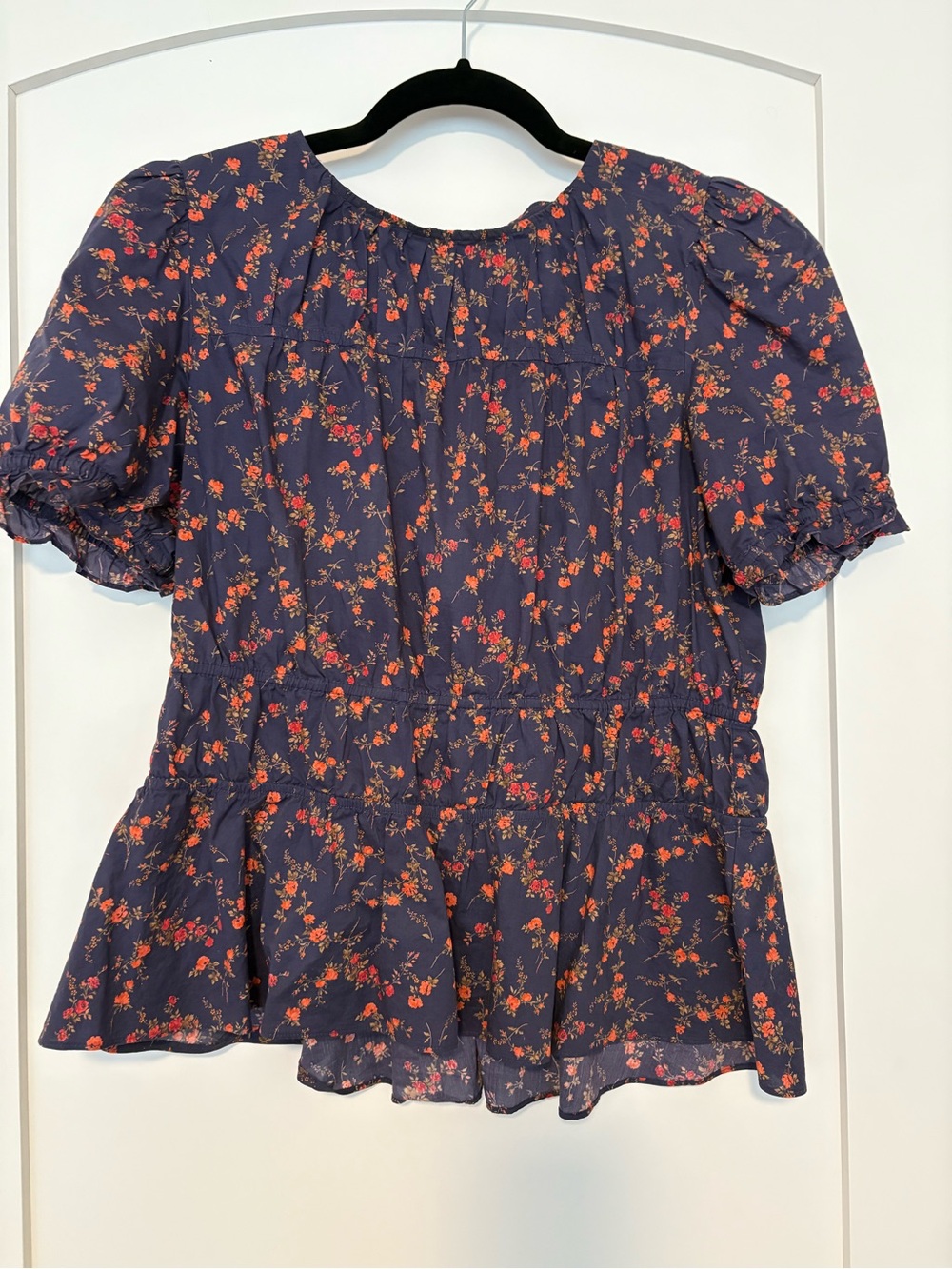 ANTONIO MELANI Navy Floral Peplum Blouse with Coral Accents